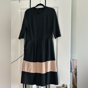 It Has Pockets! Knee length black dress